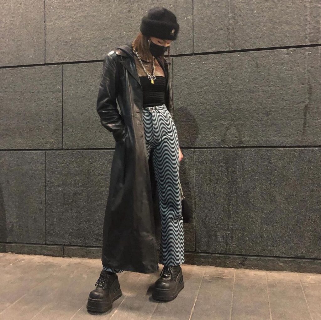 Outfit photo of a person wearing a vintage leather jacket