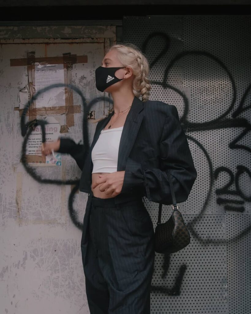 Photo of a person wearing a fall vintage outfit.