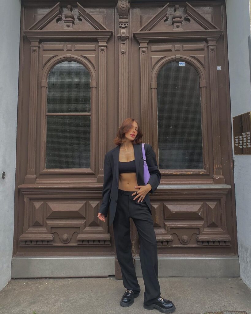 Photo of a person wearing a fall vintage outfit.